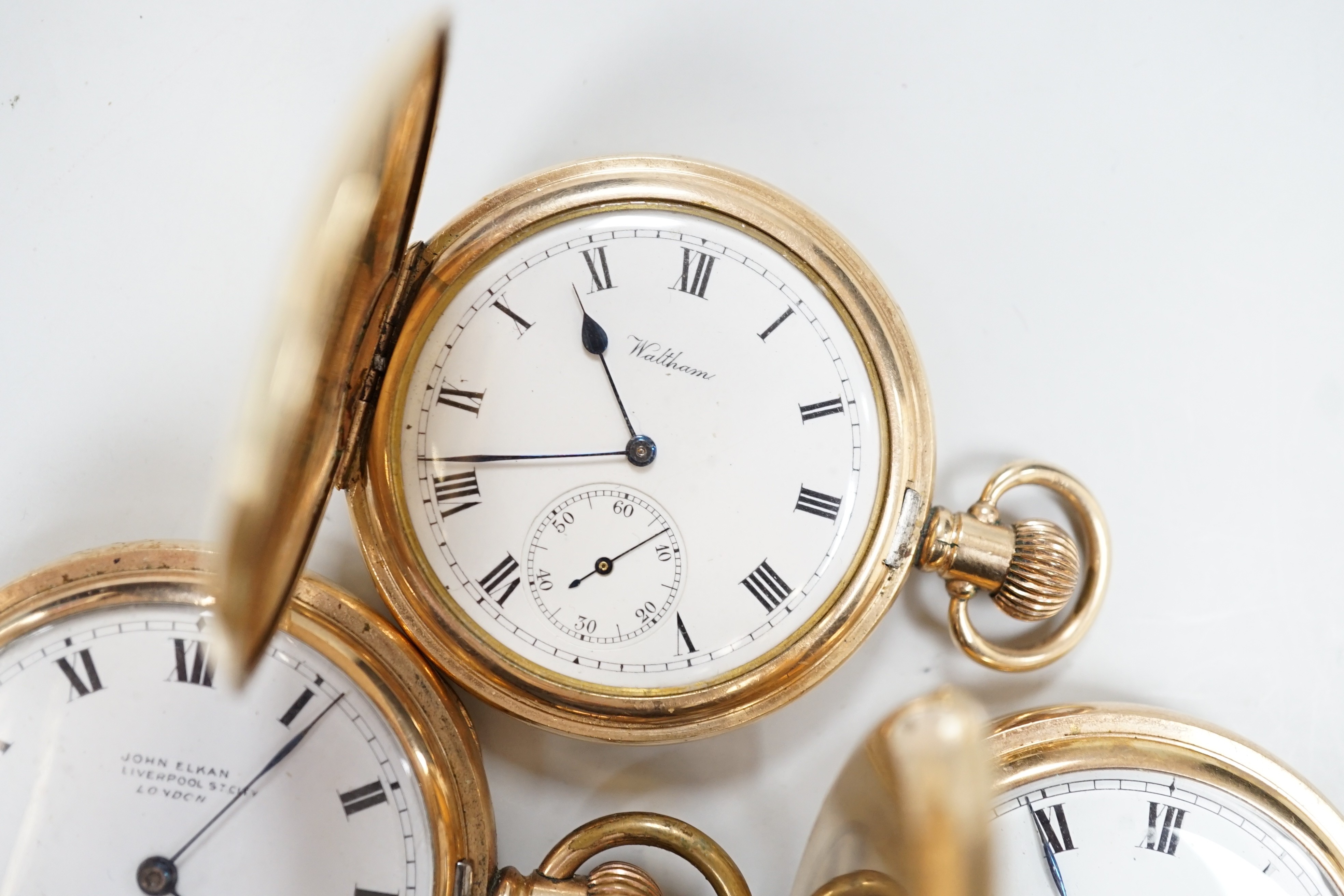 A gold plated Waltham hunter keyless pocket watch and two gold plated half hunter pocket watches, John Elkin and Garrard.